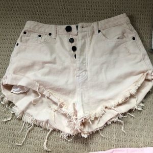 Light light pink high waisted jean shorts